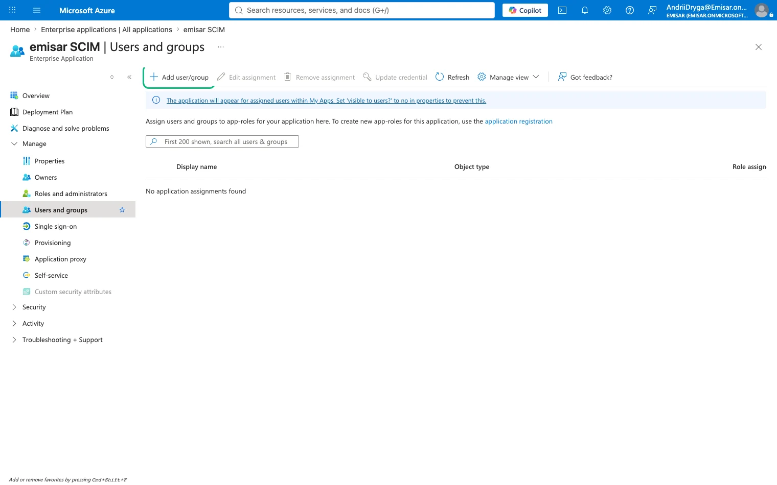 The Users and groups page of the emisar SCIM enterprise application, with Add user/group outlined in green above an empty assignment list.