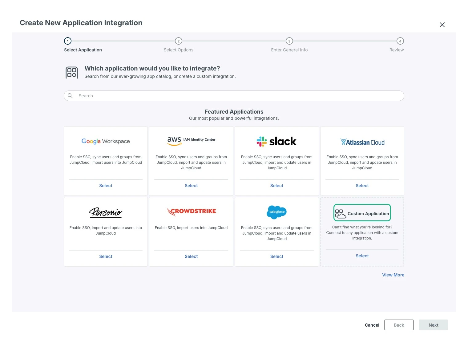 JumpCloud's Create New Application Integration wizard on step 1, Select Application, showing featured tiles for Google Workspace, AWS IAM Identity Center, Slack, Atlassian Cloud, Personio, CrowdStrike and Salesforce, with the Custom Application tile in the bottom-right corner outlined in green.